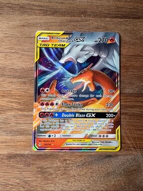 Ultra Rare Reshiram & Charizard GX 20/214 unbroken bonds Tag Team